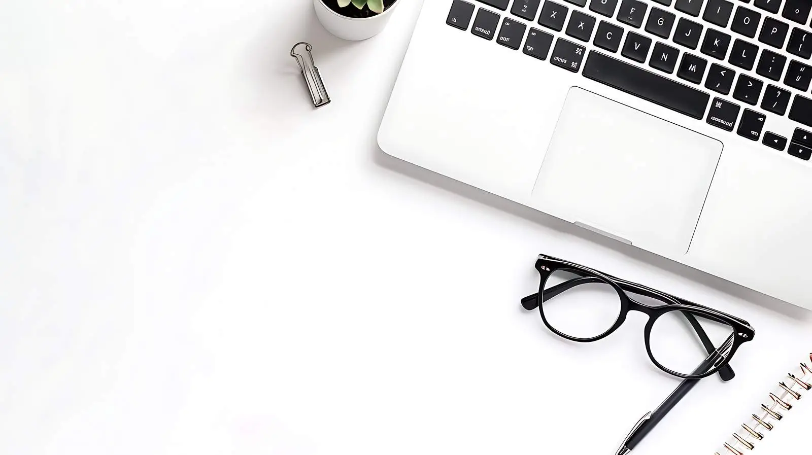 Home Office Desk Workspace with Laptop and Paper — free download from Dotvec