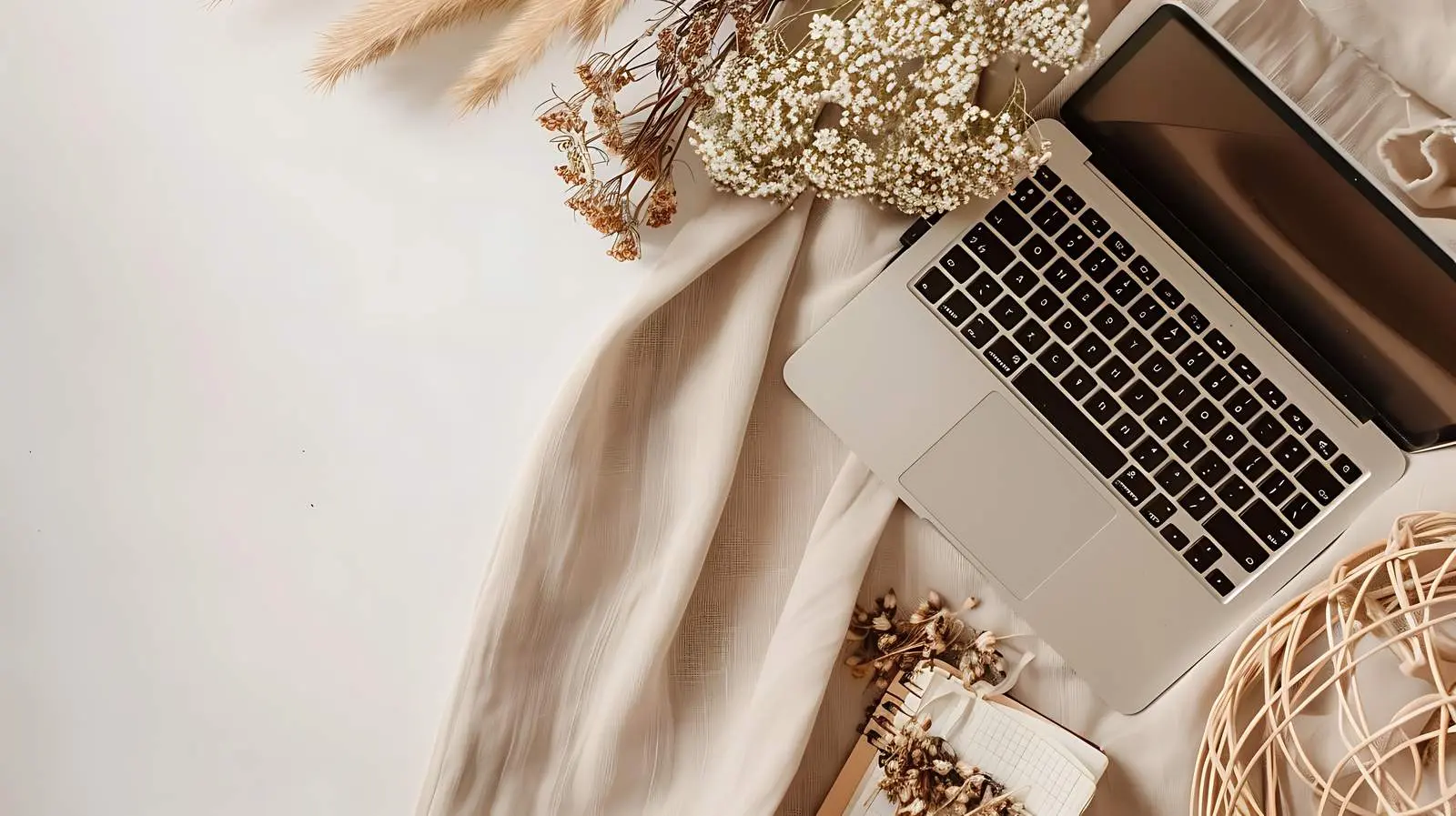 Laptop Accessories with Dried Flowers on Neutral Background — free download from Dotvec