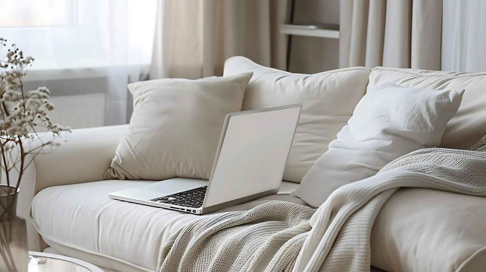 Laptop on Beige Sofa with Pillows — free download from Dotvec