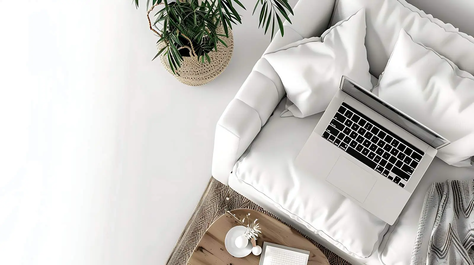 Laptop on Sofa - Minimalist Top View — free download from Dotvec