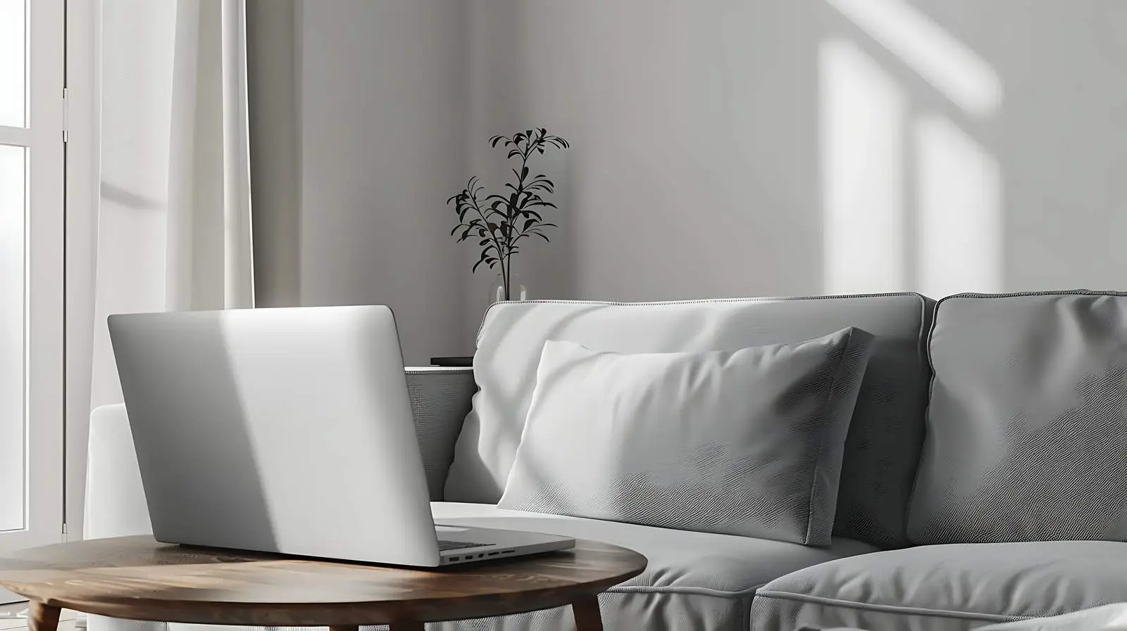 Laptop on Side Table by Comfortable Sofa — free download from Dotvec