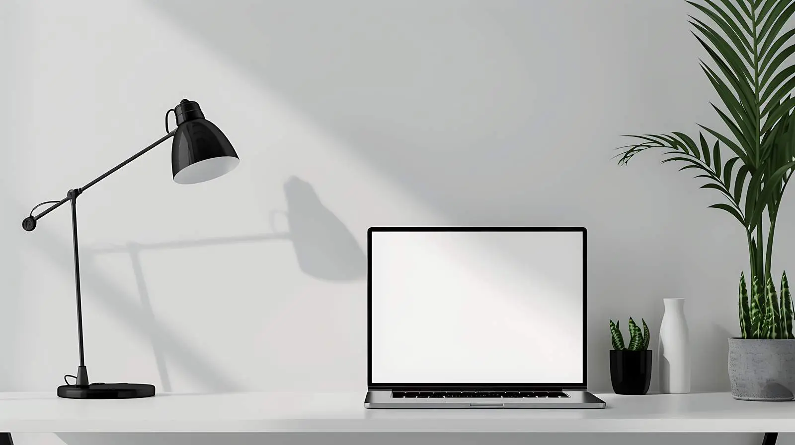 Laptop Computer with Blank Screen on Table — free download from Dotvec