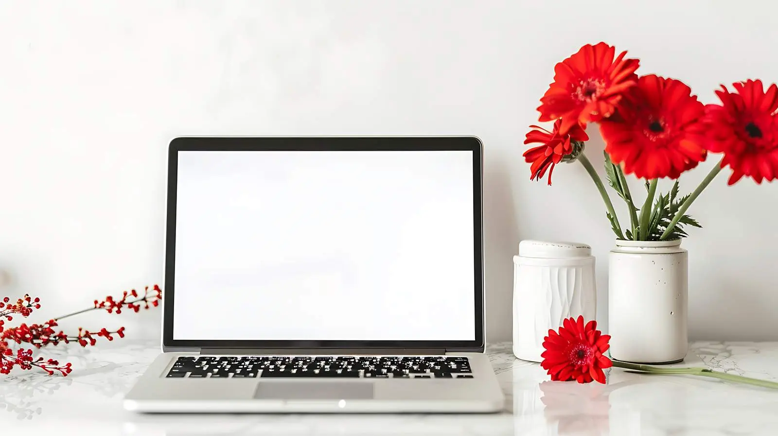 Laptop on Table with Red Gerbera Flower — free download from Dotvec