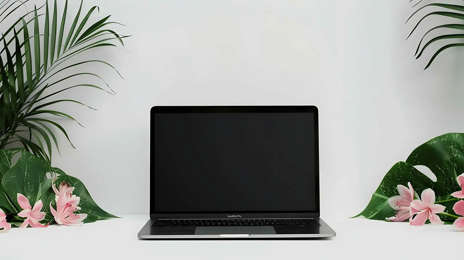 Laptop With Black Screen on Table with Flower — free download from Dotvec