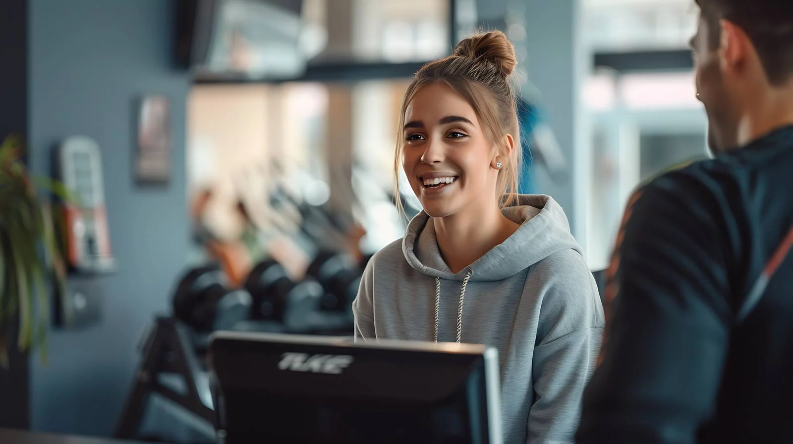 Cheerful Woman Consults Coach at Reception — free download from Dotvec