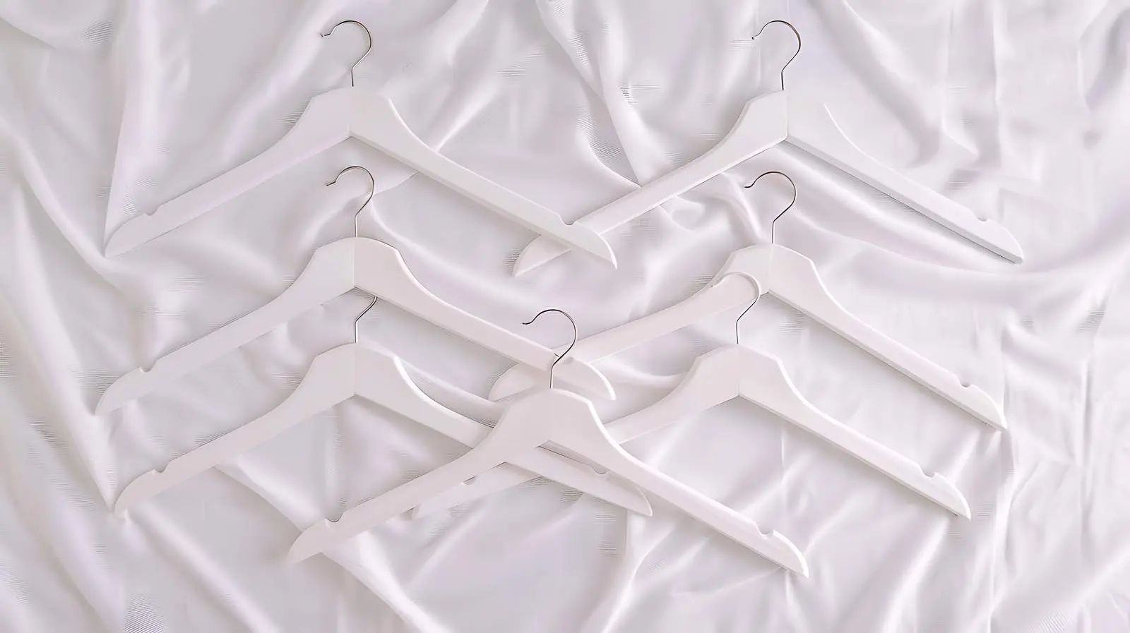 Minimalist Fashion Hangers on White Linen Cloth — free download from Dotvec