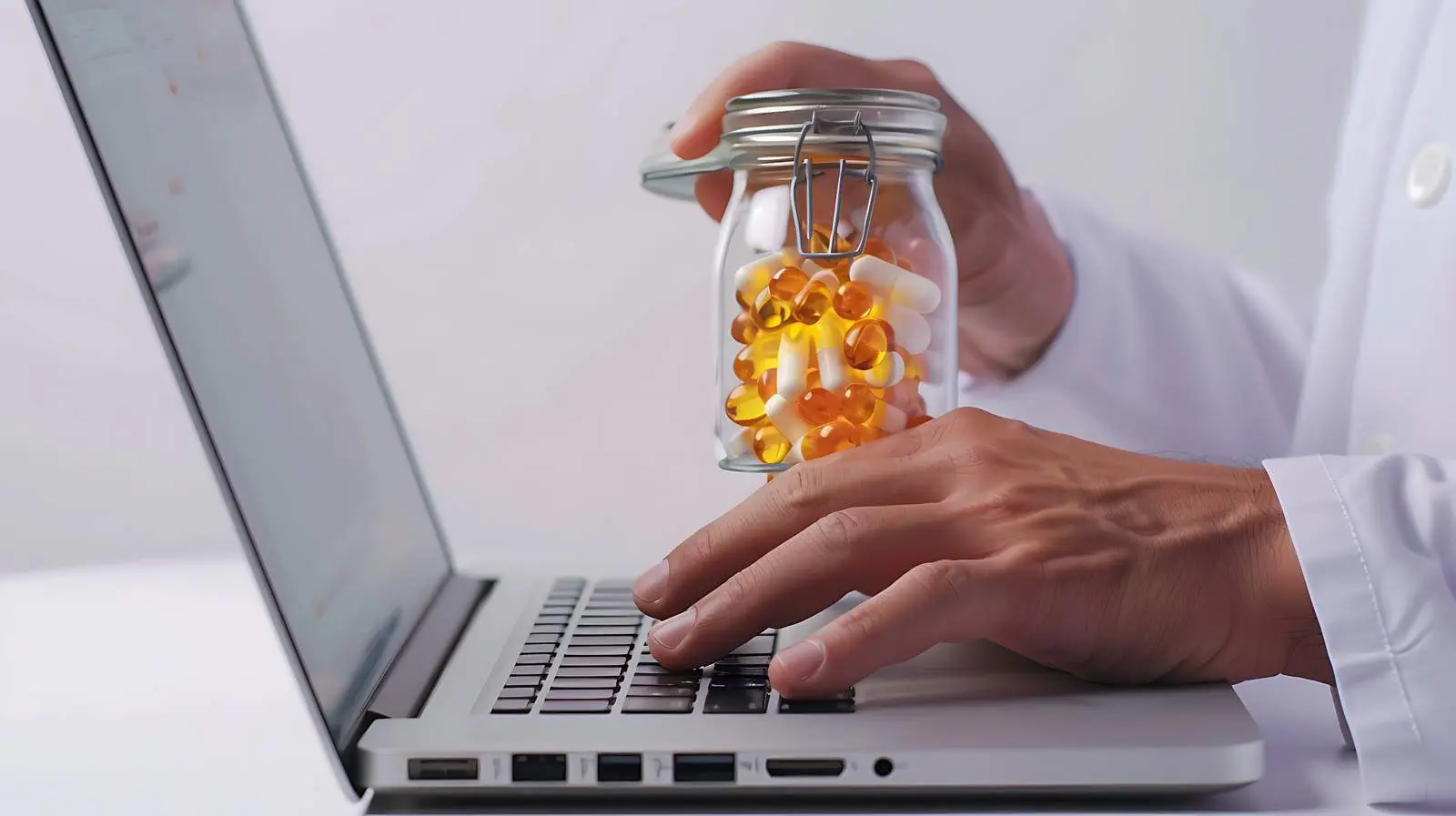 Doctor Holding Pill Jar and Typing — free download from Dotvec