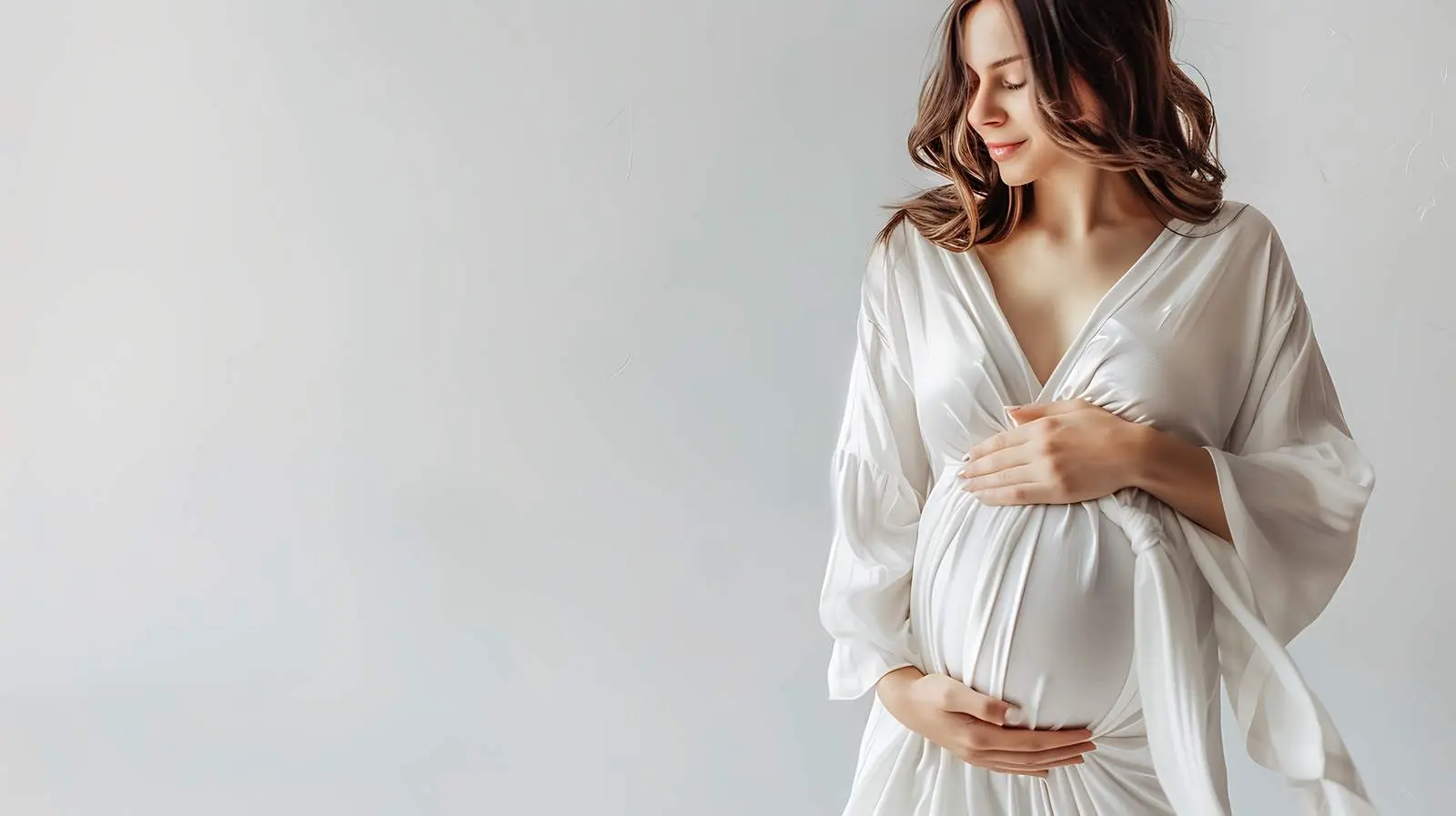 Happy Pregnant Woman Embracing Maternity Joy — free download from Dotvec