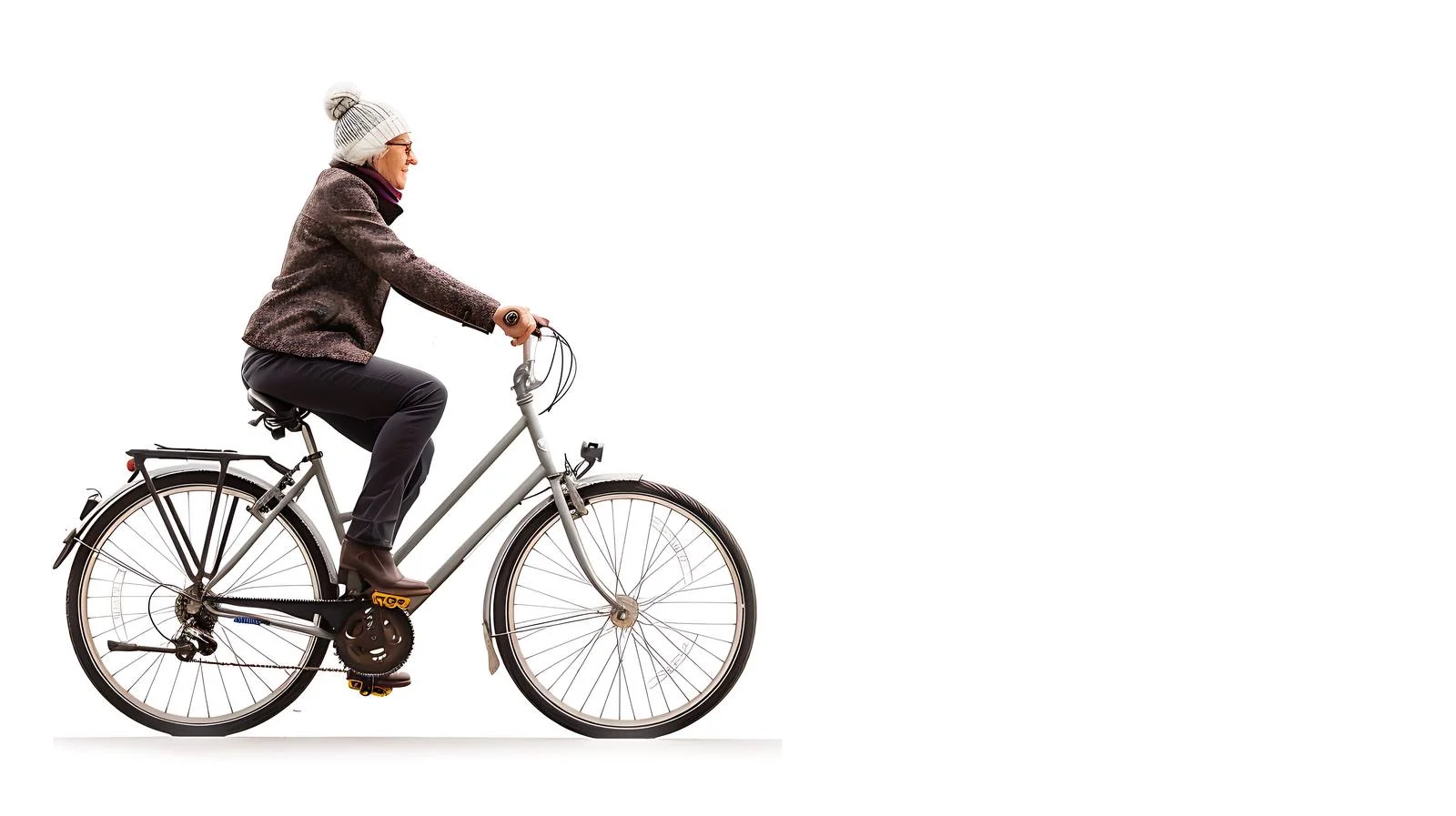 Active Mature Woman Cycling in Urban Environment — free download from Dotvec