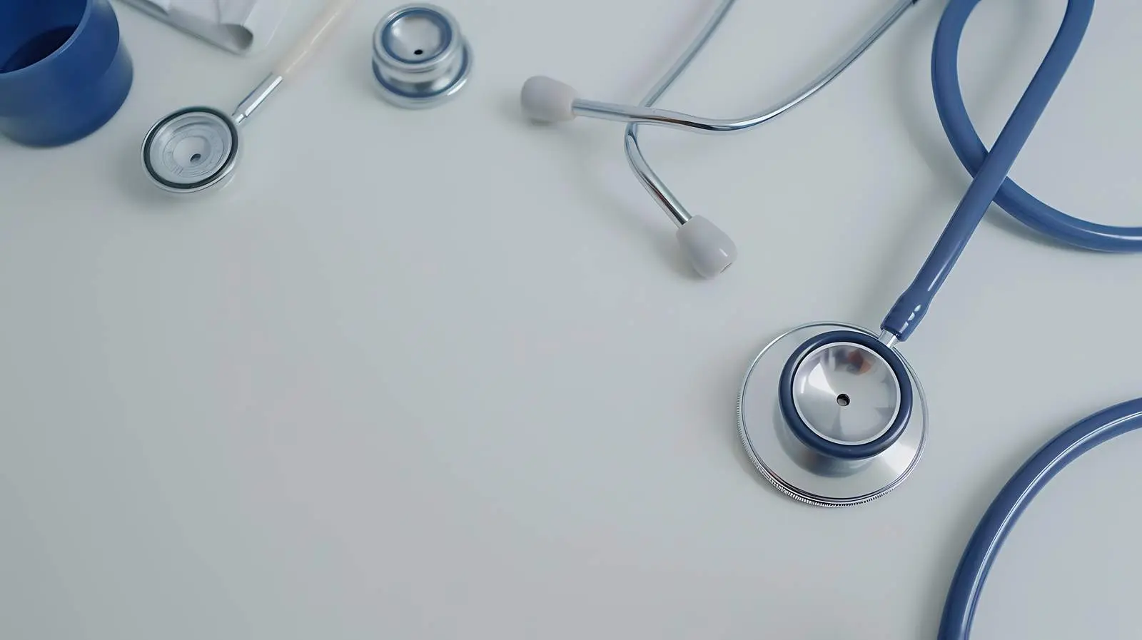 Stethoscope and Medical Preparations on Office Table — free download from Dotvec