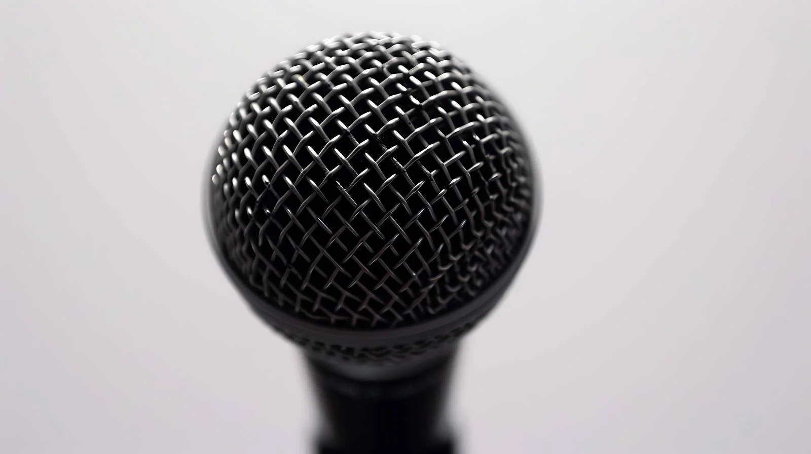 Vibrant Karaoke Mic on Stage Close-Up — free download from Dotvec