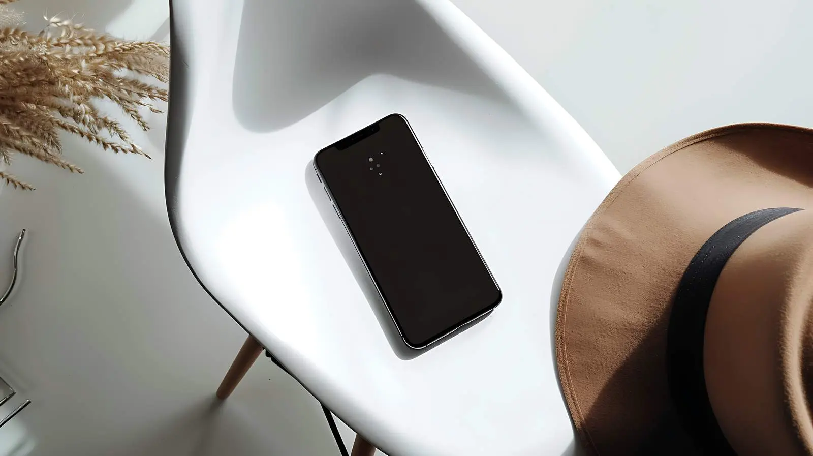 Mobile Phone and Elegant Hat Flat Lay — free download from Dotvec