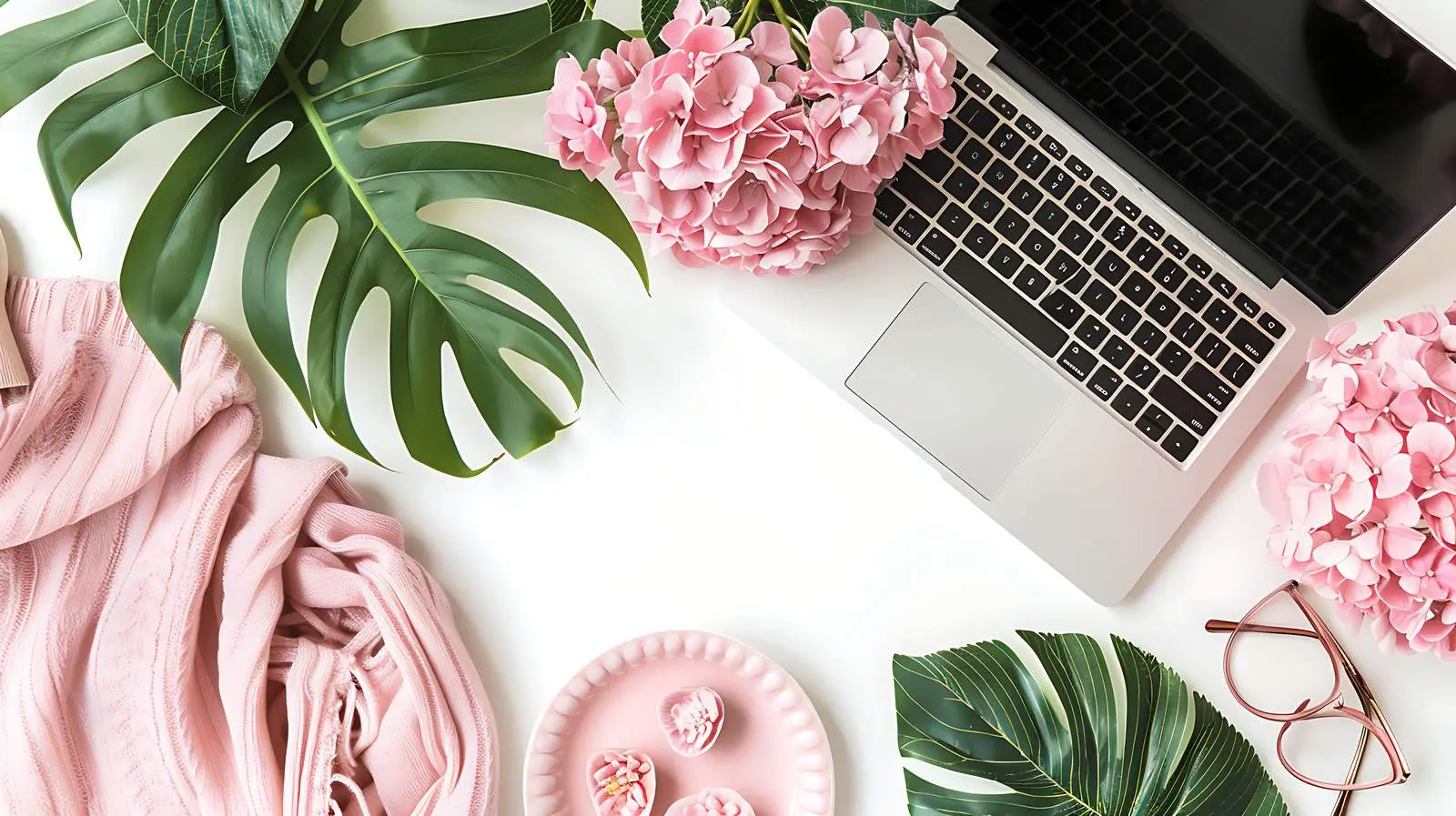 Modern Home Office Desk with Laptop and Flowers — free download from Dotvec