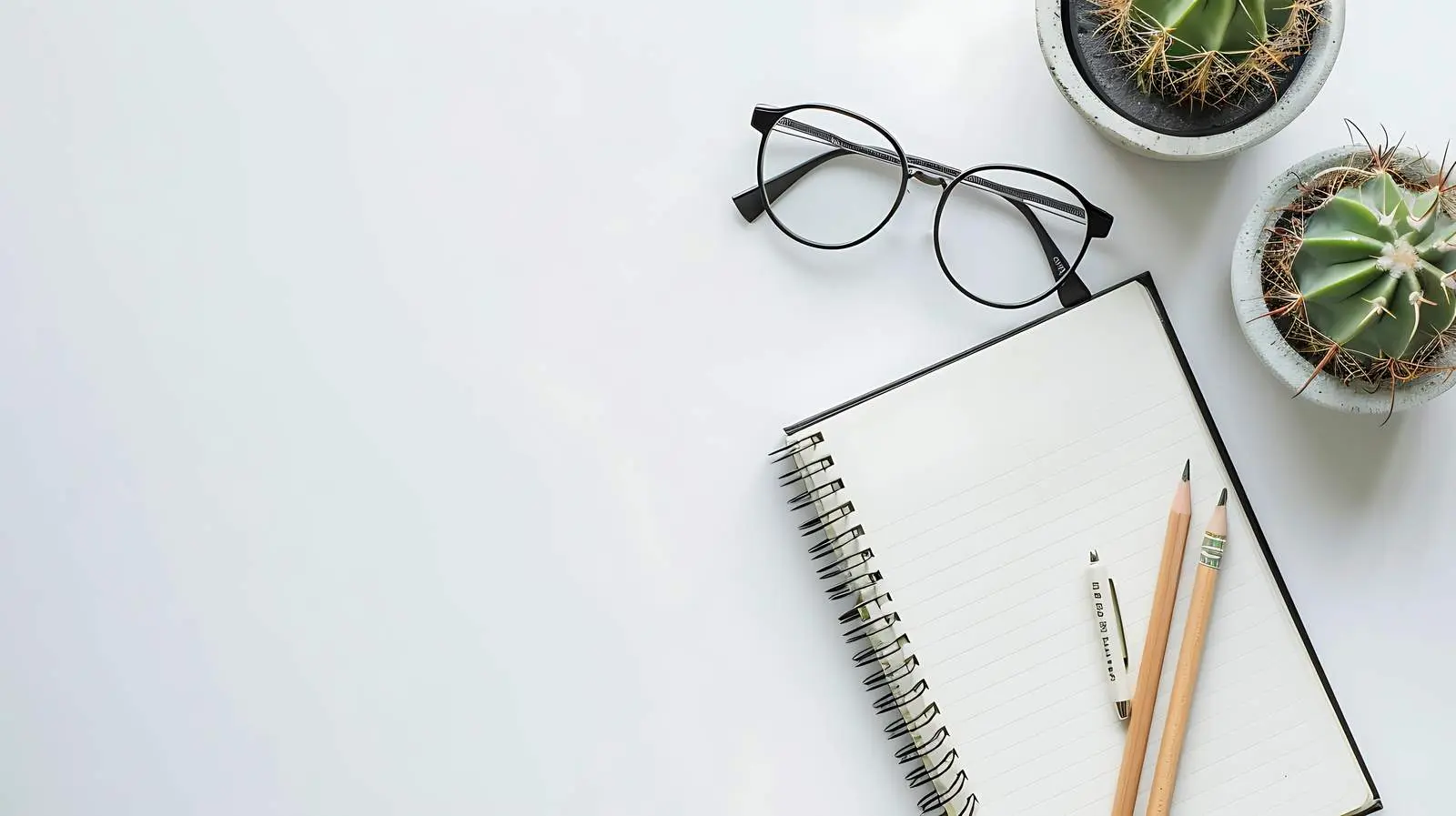 Office Desk Setup with Notebook and Glasses — free download from Dotvec