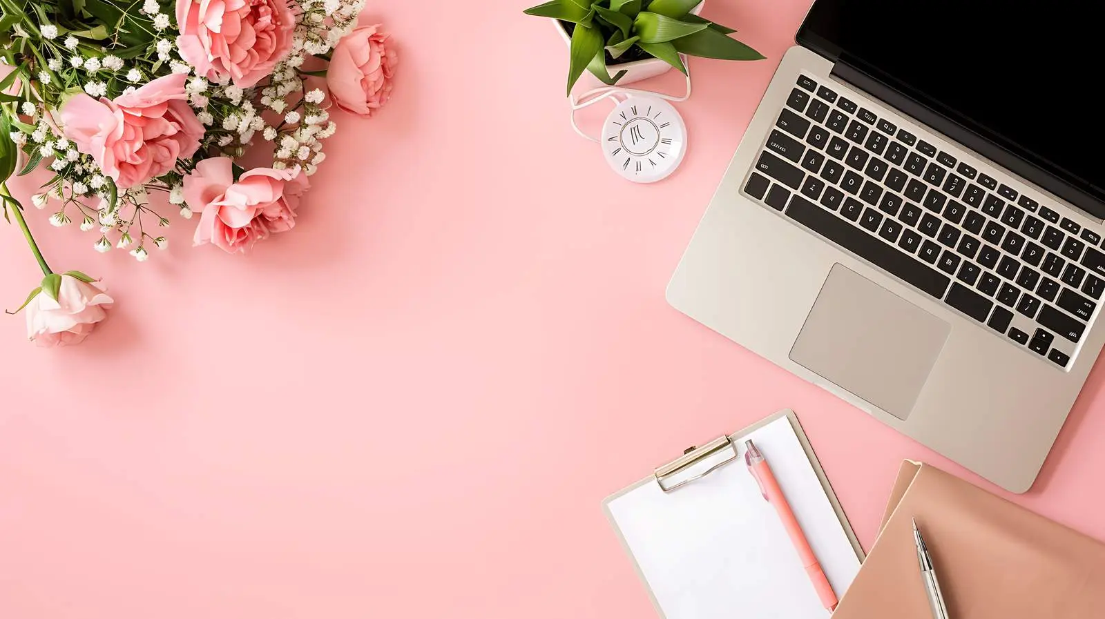 Stylish Office Desk Workspace with Laptop and Flowers — free download from Dotvec