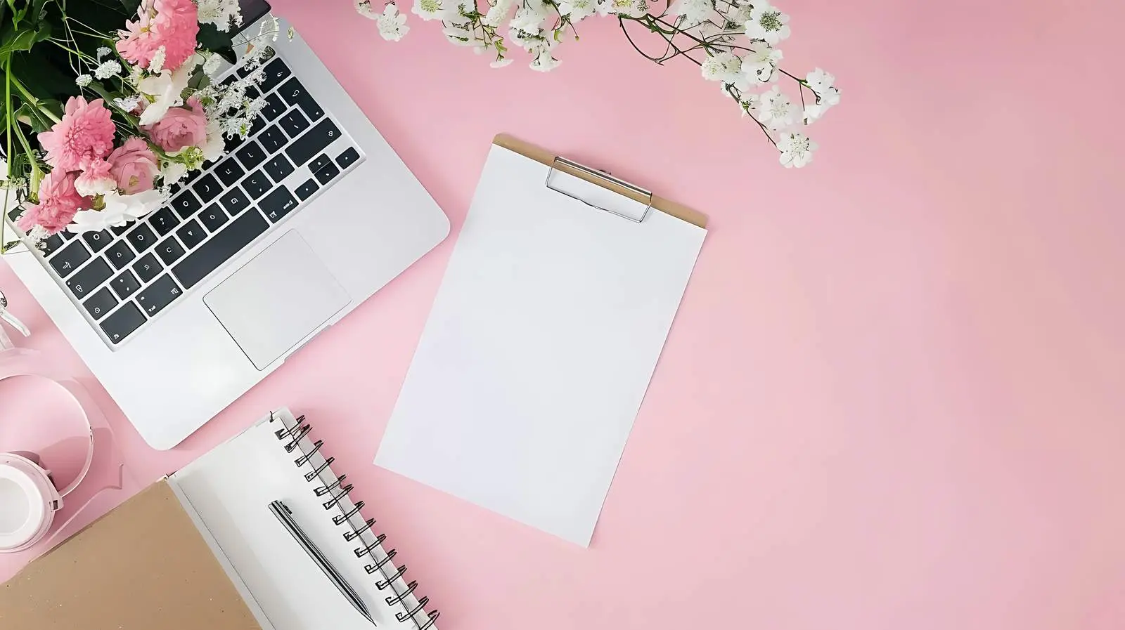 Modern Office Desk with Laptop and Flowers — free download from Dotvec