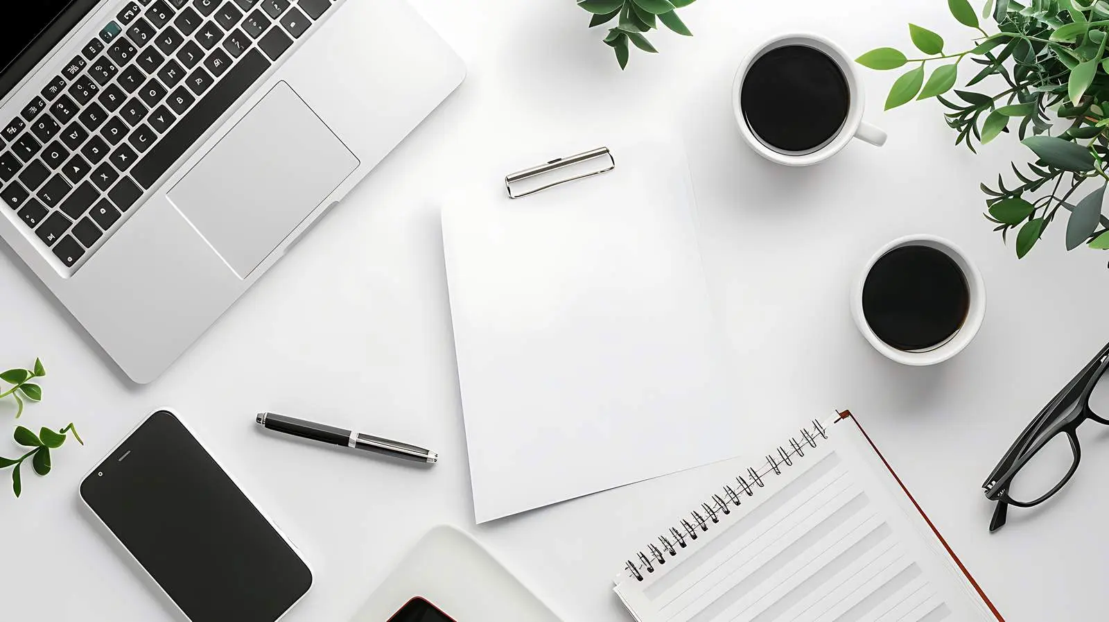 Modern Office Setup with Notepad and Laptop — free download from Dotvec