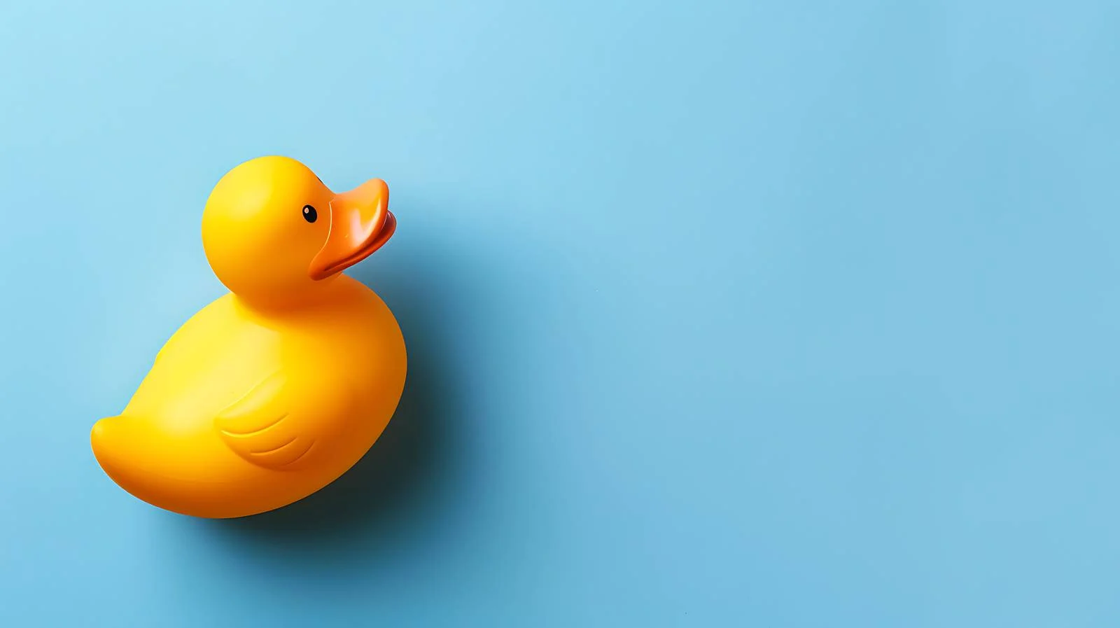 Vivid Orange Duck on Blue Background — free download from Dotvec