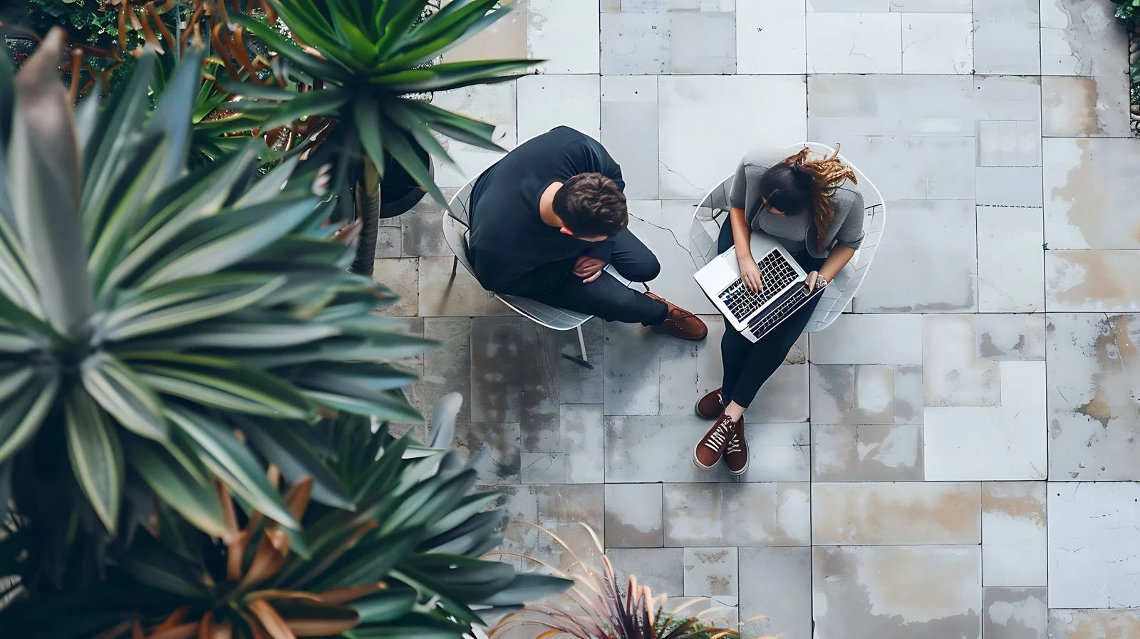 Man on Terrace Working on Laptop — free download from Dotvec