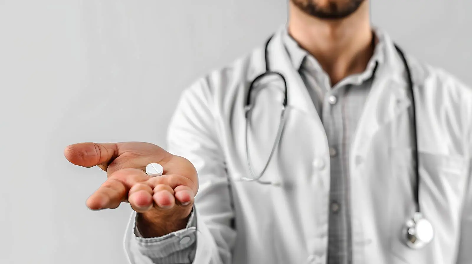 Male Doctor Packing Pills Isolated on White Background — free download from Dotvec