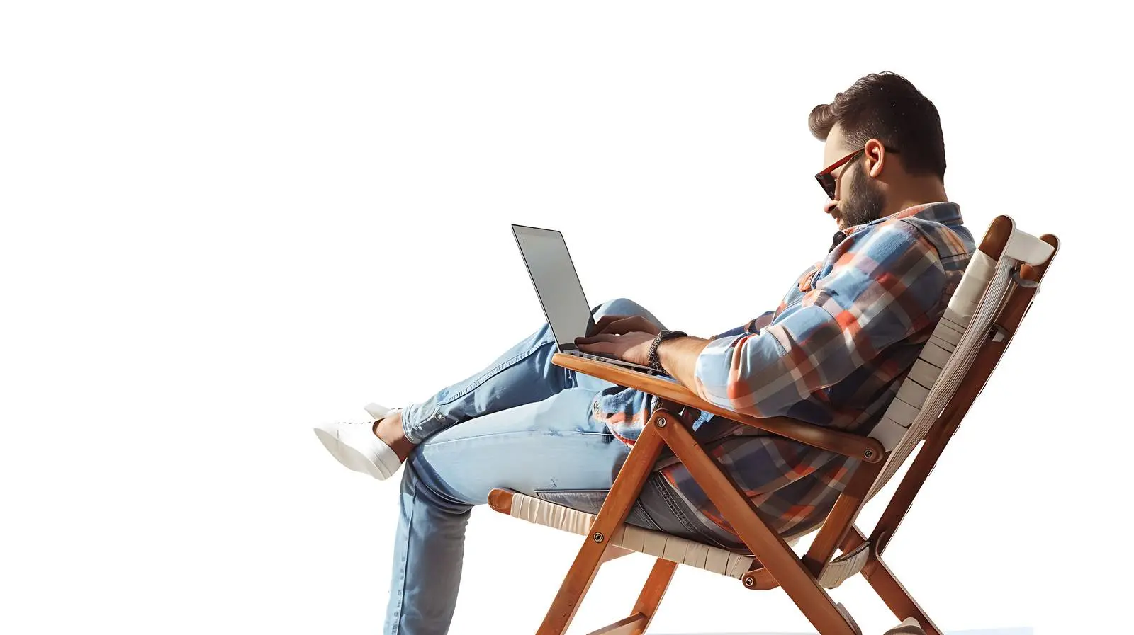 Person Working on Laptop in Lounge Chair — free download from Dotvec