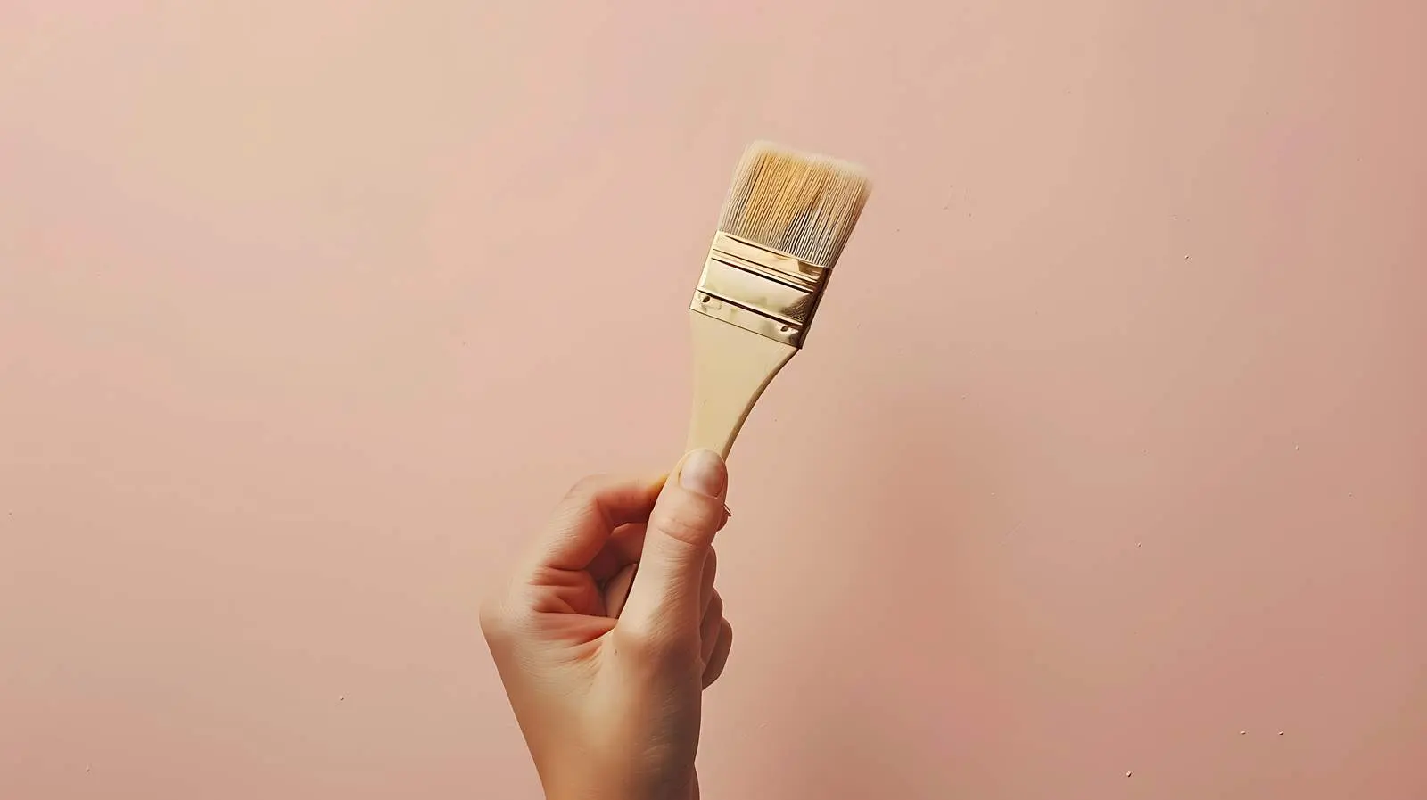 Person Holding Painting Brush on Neutral Background – free paint image from Dotvec