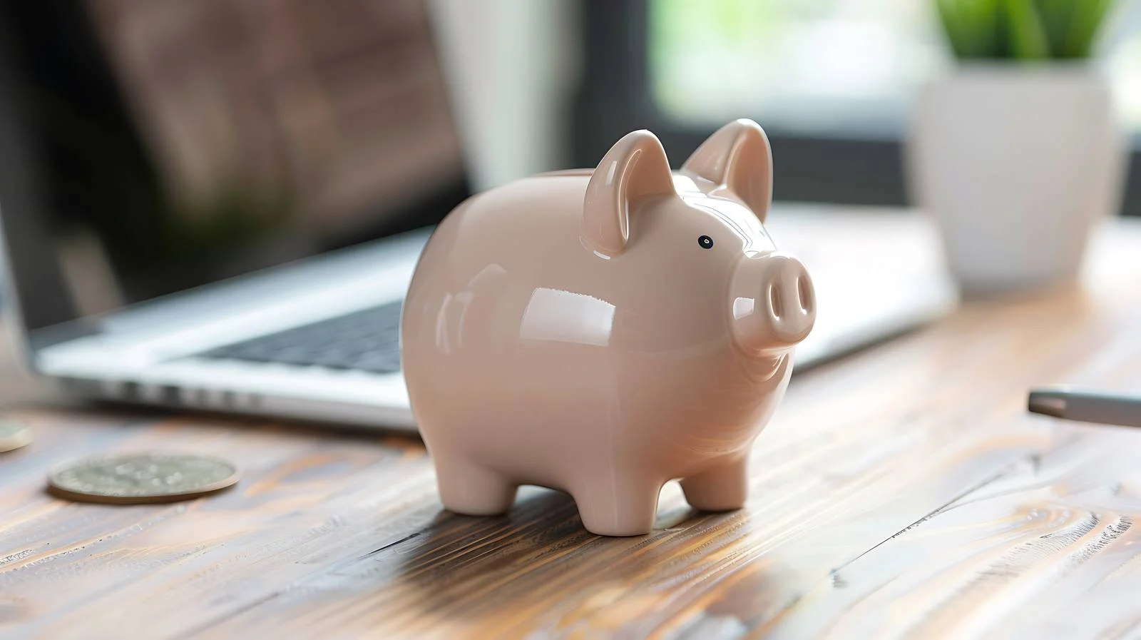 Finance Workspace with Piggy Bank and Laptop — free download from Dotvec
