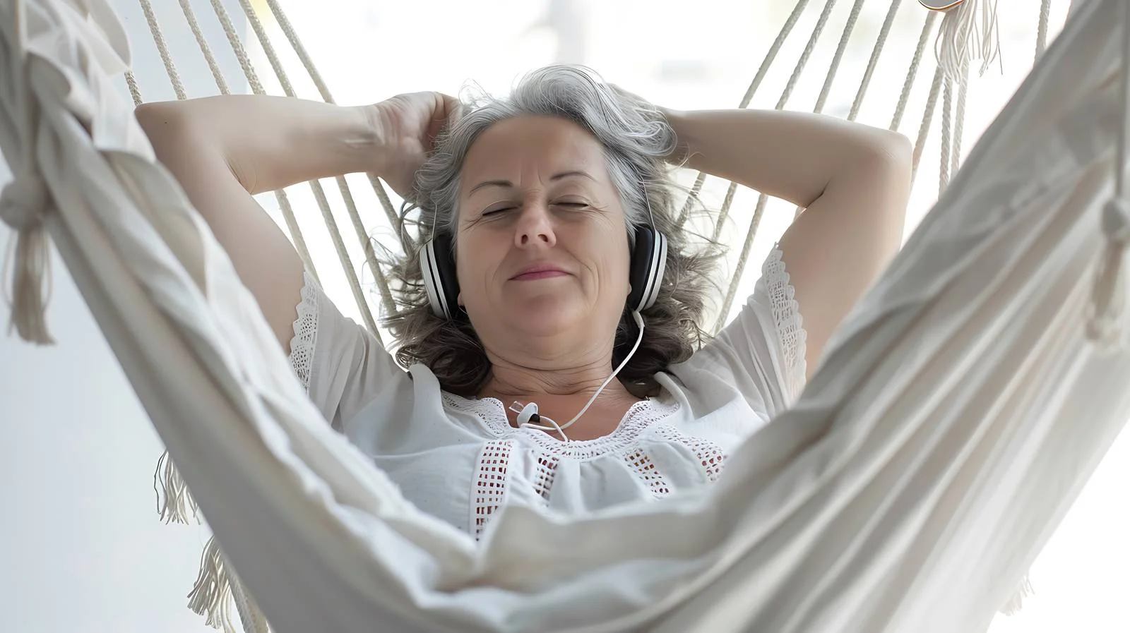 Contemplative Woman in Hammock — free download from Dotvec