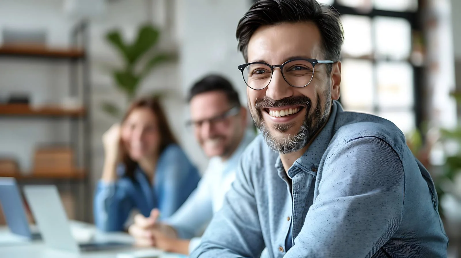 Smiling Businessman Meeting Image — free download from Dotvec