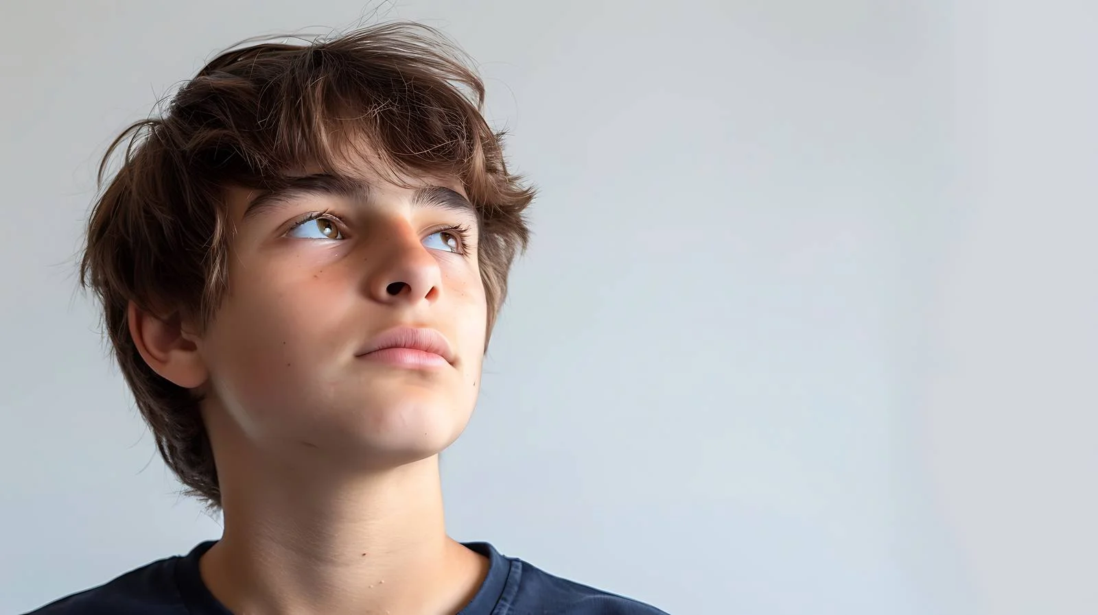Teenager covering ears with closed eyes – free gesturing image from Dotvec