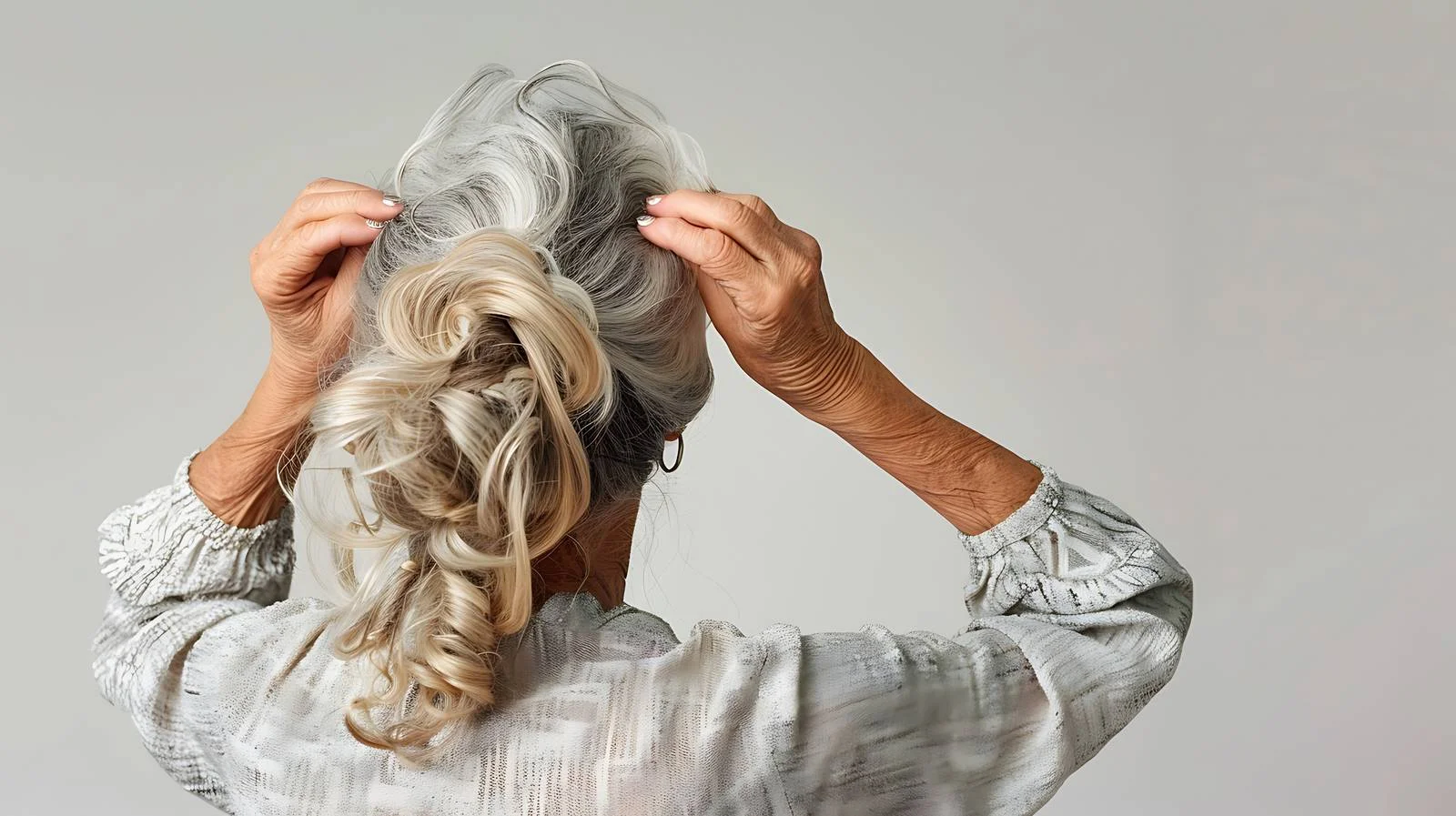 Elderly lady grooming hair in isolation — free download from Dotvec
