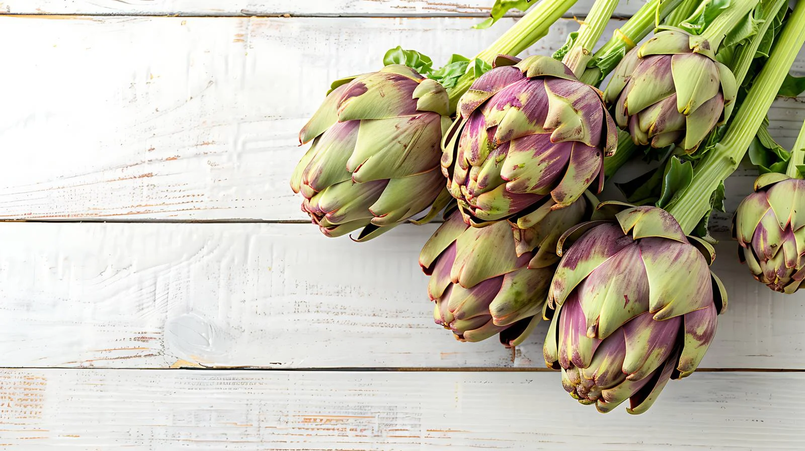 Fresh Artichokes on White Wooden Table — free download from Dotvec
