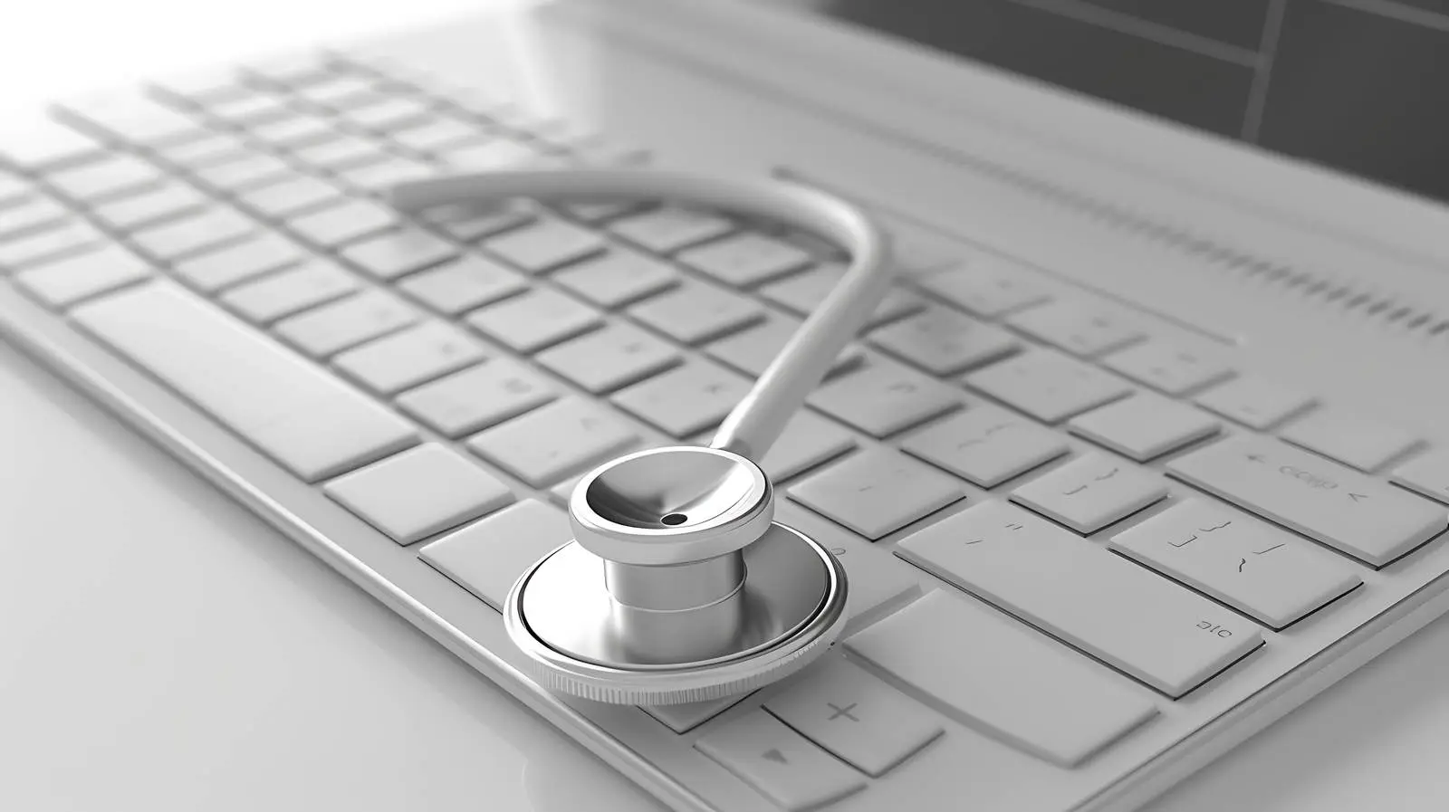 Silver Stethoscope on Keyboard Isolated Image – free medical training image from Dotvec