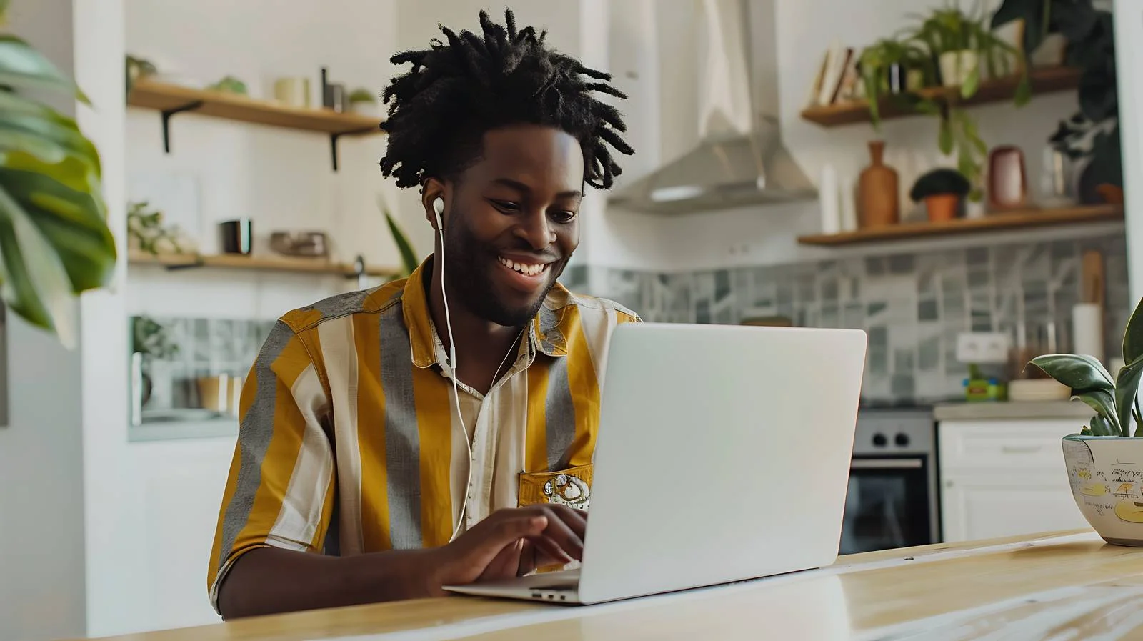 Man Smiling in Modern Apartment Setting — free download from Dotvec