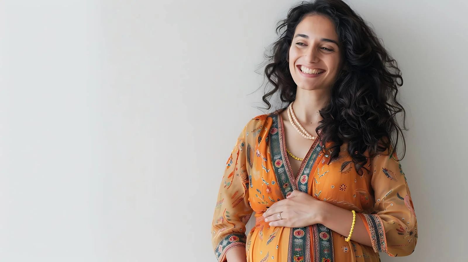 Radiant Pregnant Woman Stands Smiling — free download from Dotvec