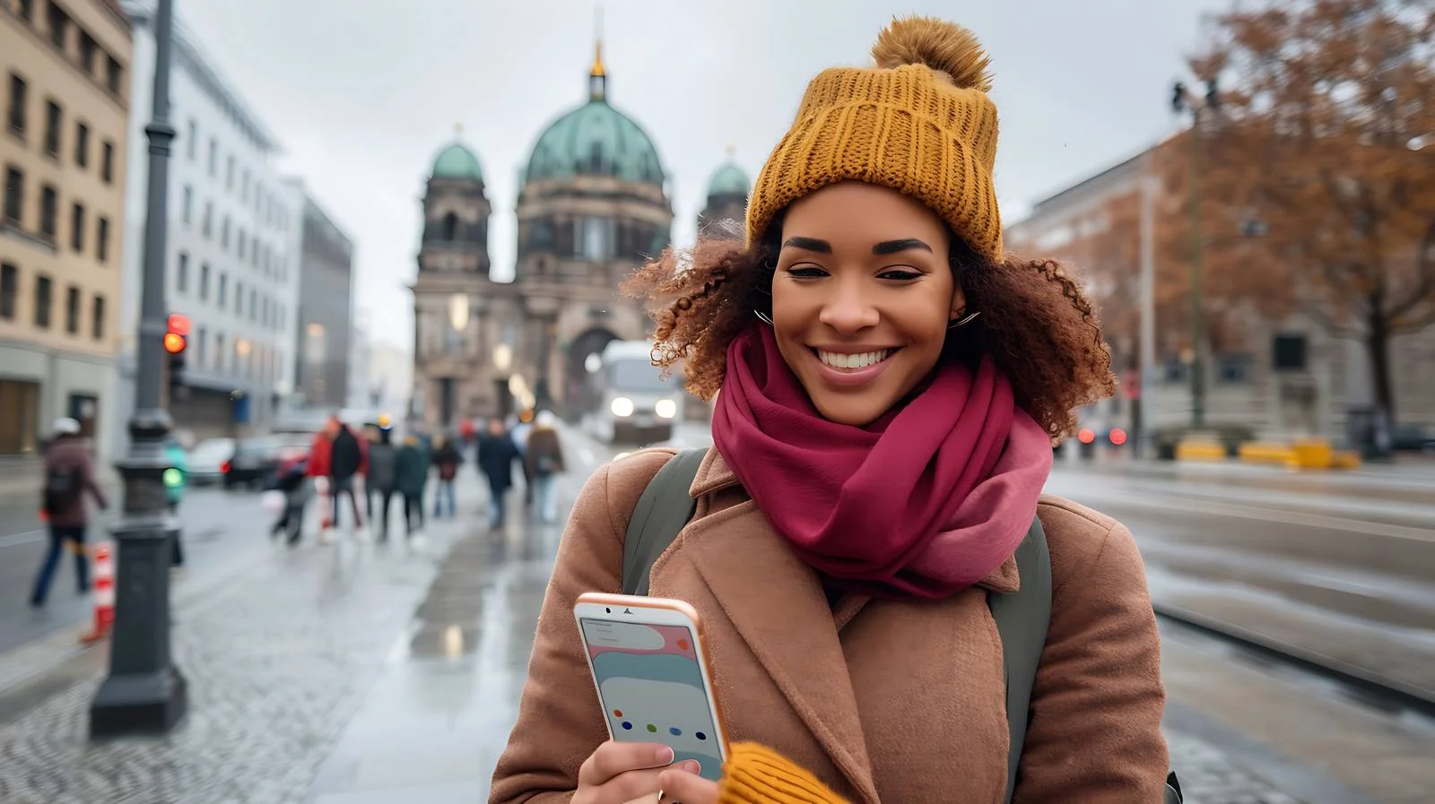Happy woman using smartphone in urban setting — free download from Dotvec