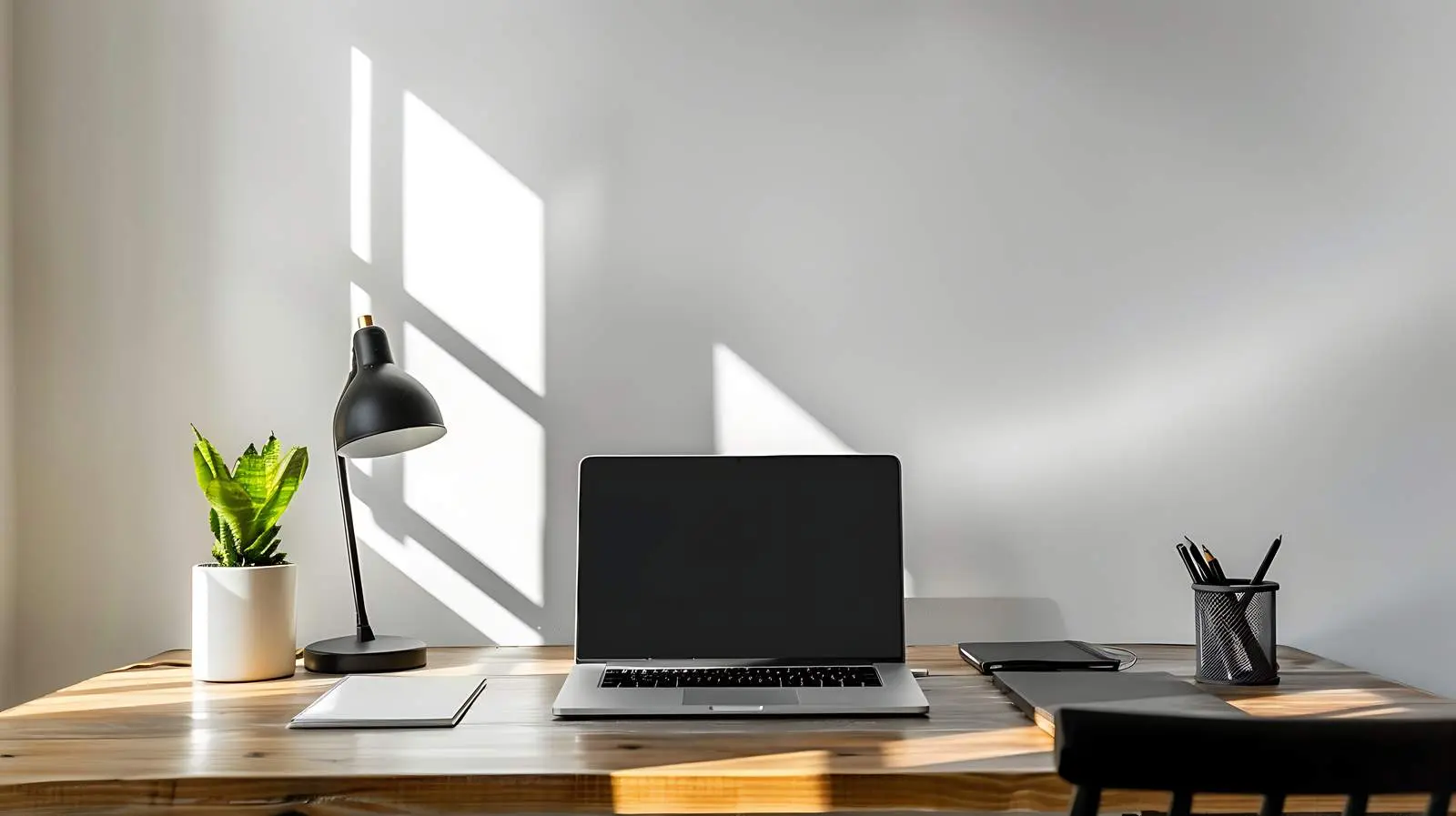 Stylish Workspace with Laptop and Table Lamp — free download from Dotvec