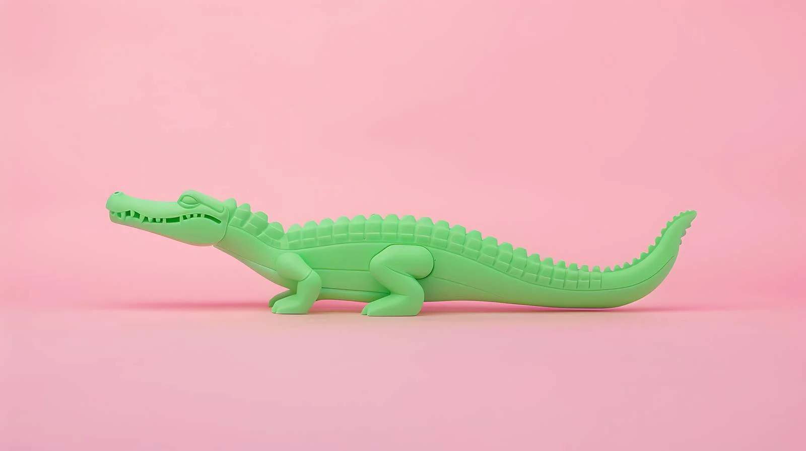 Crocodile Toy on Pink Background — free download from Dotvec
