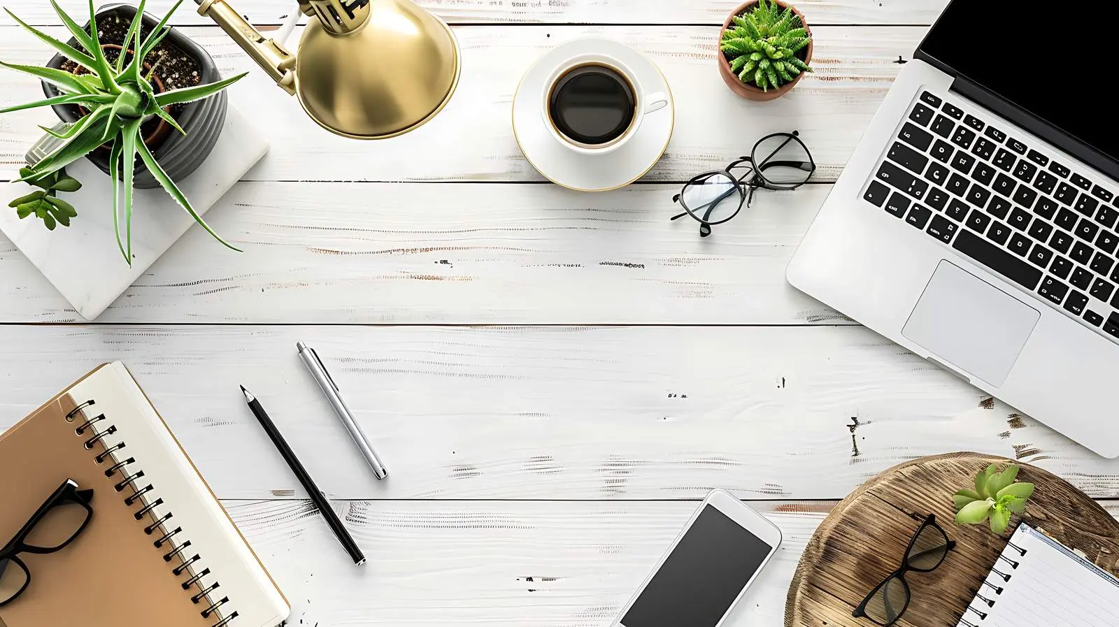 Laptop and Notebooks on Wooden Desk with Lamp — free download from Dotvec