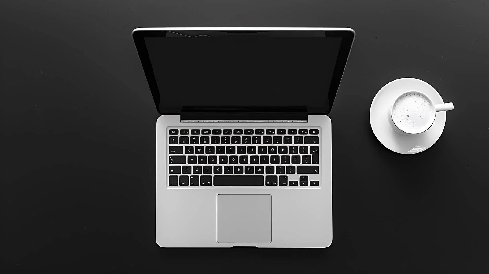 Professional Laptop Top View on Black — free download from Dotvec