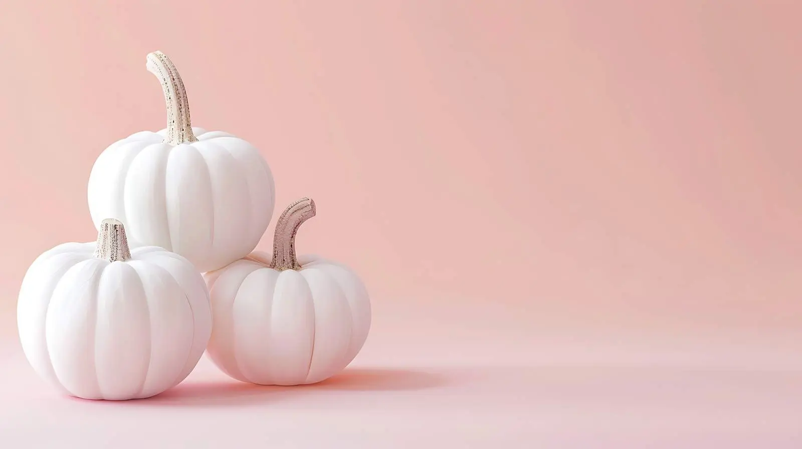 White Decorative Pumpkins on Pastel Pink Background — free download from Dotvec