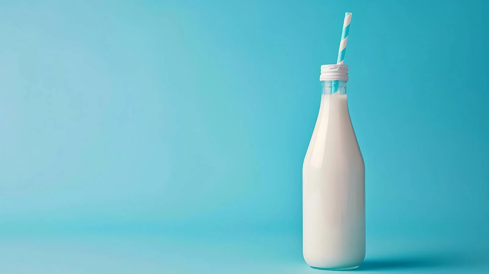 Refreshing Drink Bottle on Blue Background — free download from Dotvec