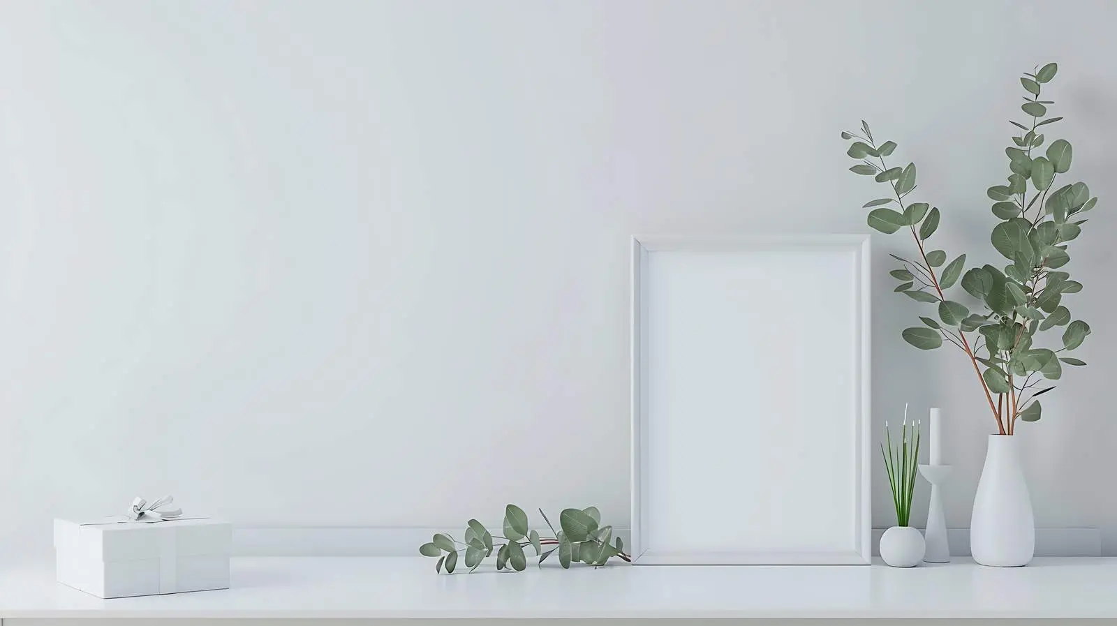 Elegant White Table with Photo Frame and Eucalyptus — free download from Dotvec