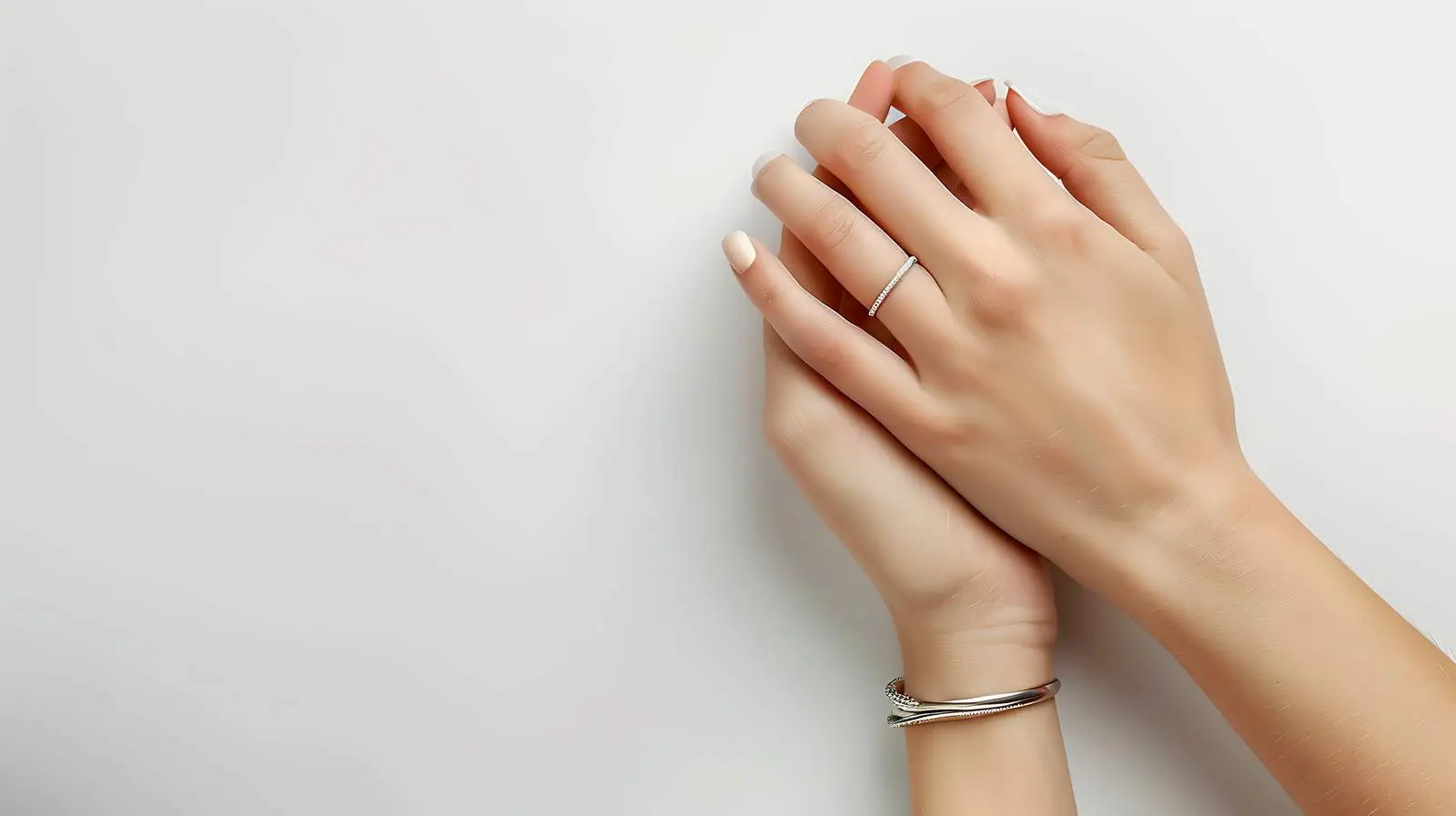 Elegant Hands with Ring and Bracelet on White — free download from Dotvec