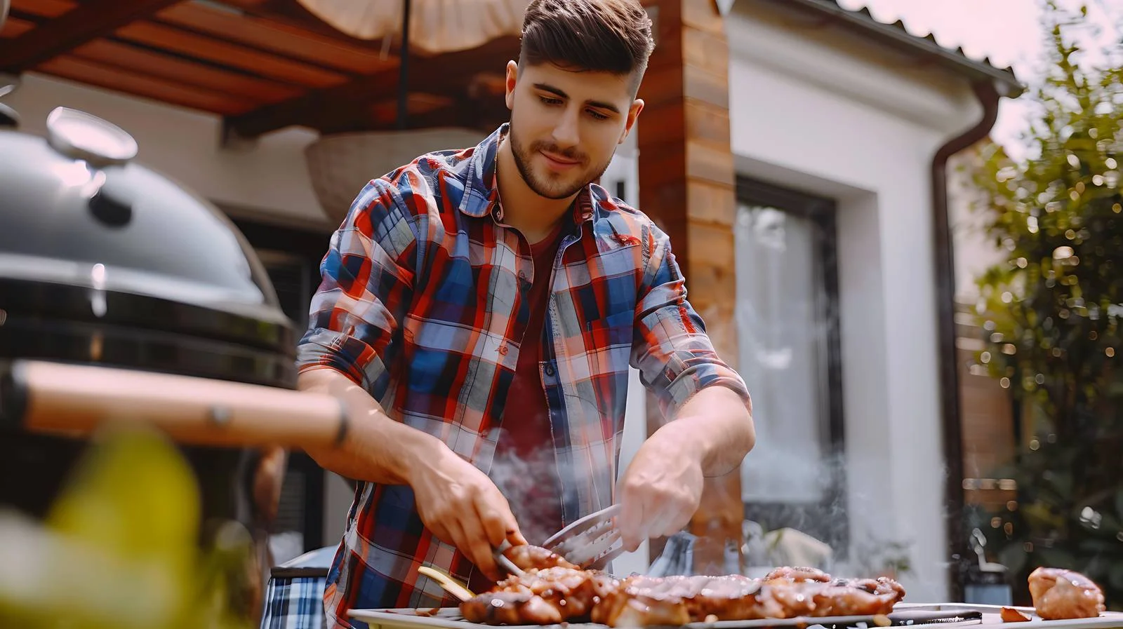 Young Man Grilling Meat for Friends — free download from Dotvec
