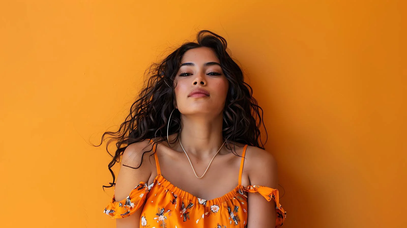 Young Latina on Orange Background — free download from Dotvec