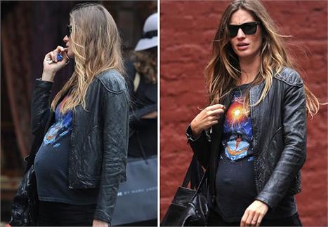 Finalmente Gisele Bündchen foi fotografada usando uma roupa que mostra bem a barriguinha de sete meses de gravidez da top.