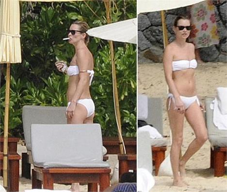 Kate Moss passa os dias na Tailândia, sem abrir mão da nicotina.