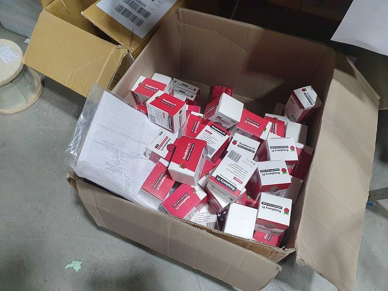 cardboard-box-filled-with-red-white-medicine-packages