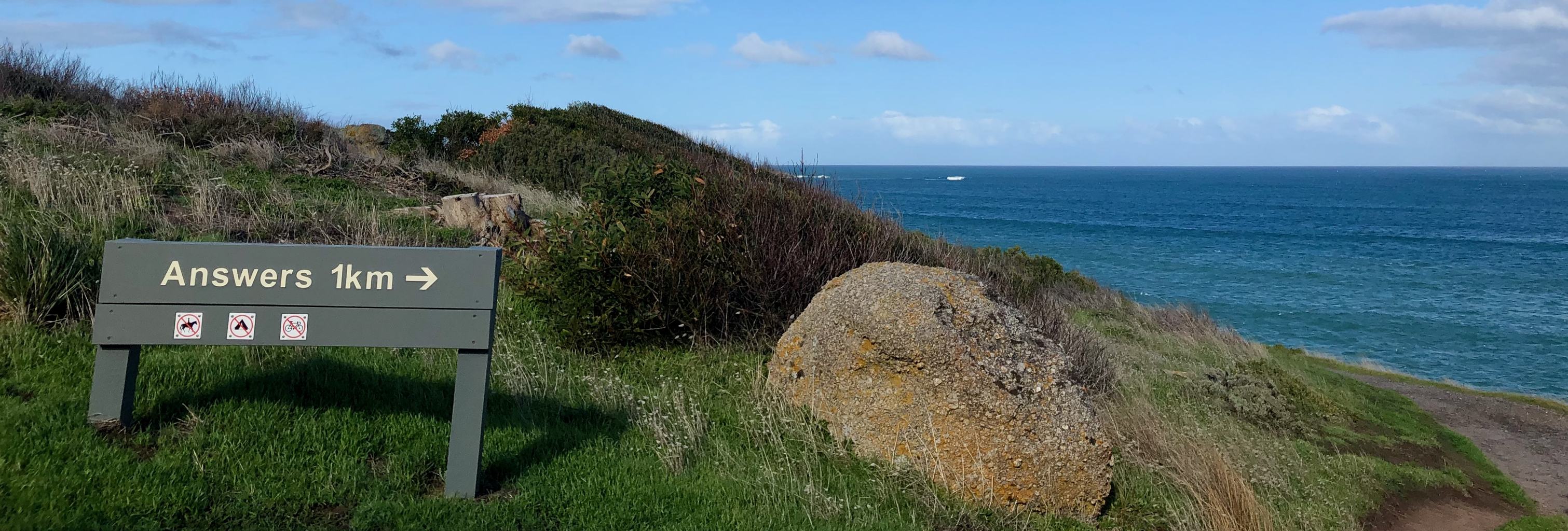 Coastal path sign to Answers, 1km ahead